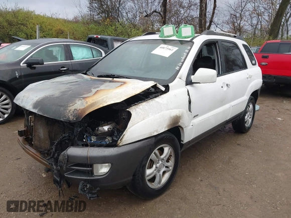 2006 Kia Sportage LX z VIN KNDJE723267254864, wystawiony jako IAAI lot #40875961 z przebiegiem 295 412 mil mil oraz . Historia ofert i sprzedaży dostępna na DreamBid. Obrazek 2.