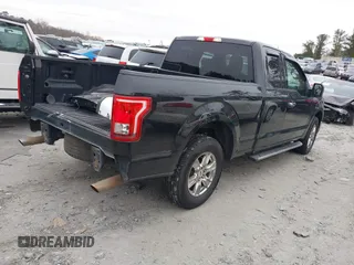 2015 Ford F-150 XL with VIN 1FTEX1CF1FFA08279, listed as a IAAI auction lot 41373351 with 162,291 mi miles. Bid and sale history available at carsss.com. Image 4.
