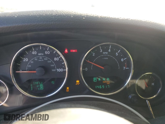 2014 Jeep Wrangler Sahara with VIN 1C4AJWBGXEL125544, listed as a Copart auction lot 51961845 with 146,917 mi miles and Salvage title. Bid and sale history available at DreamBid. Image 9.