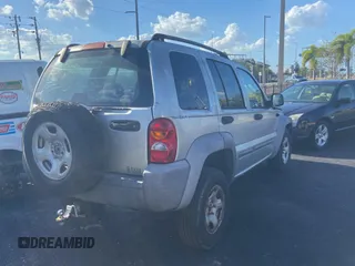 2002 Jeep Liberty Sport with VIN 1J4GL48K72W243074, listed as a Copart auction lot 80737354 with 127,177 mi miles and Clean Title. Bid and sale history available at carsss.com. Image 4.