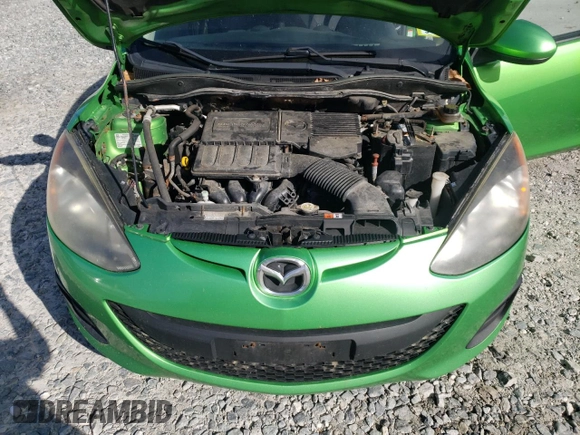 2011 Mazda 2 Sport z VIN JM1DE1HZXB0105062, wystawiony jako Copart lot #57248745 z przebiegiem 176 864 mil mil oraz Czysty tytuł • Clean title. Historia ofert i sprzedaży dostępna na DreamBid. Obrazek 11.