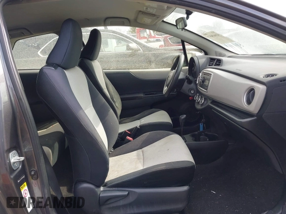 2013 Toyota Yaris L with VIN JTDJTUD30DD568688, listed as a IAAI auction lot 41665697 with 174,007 mi miles. Bid and sale history available at carsss.com. Image 5.