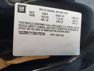 2006 Pontiac G6 GTP with VIN 1G2ZM171764170734, listed as a IAAI auction lot 41439398 with 149,479 mi miles. Bid and sale history available at carsss.com. Image 9.