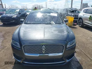 2017 Lincoln Continental Reserve z VIN 1LN6L9RP0H5636532, wystawiony jako IAAI lot #41882280 z przebiegiem 98 733 mil mil oraz . Historia ofert i sprzedaży dostępna na DreamBid. Obrazek 12.