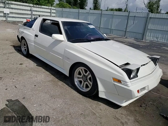 1988 Chrysler Conquest z VIN JJ3CC54N7JZ039025, wystawiony jako Copart lot #66072584 z przebiegiem 79 407 mil mil oraz Szkody całkowita. Historia ofert i sprzedaży dostępna na DreamBid. Obrazek 11.