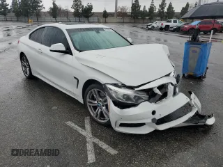 2014 BMW 4 Series 428i with VIN WBA3N7C58EK220087, listed as a Copart auction lot 45094625 with Not Provided miles and Salvage Title. Bid and sale history available at DreamBid. Image 4.