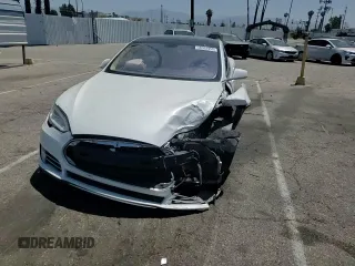2013 Tesla Model S Performance с VIN 5YJSA1DP3DFP10567, выставлен на аукционе Copart как лот 58352955 с пробегом 128 438 миль миль и Списание • Salvage title. История ставок и продаж доступна на DreamBid. Изображение 14.
