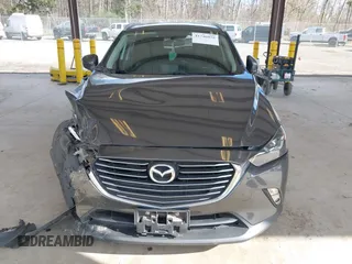 2017 Mazda CX-3 Grand Touring z VIN JM1DKFD70H0150496, wystawiony jako IAAI lot #41746038 z przebiegiem 108 091 mil mil oraz . Historia ofert i sprzedaży dostępna na DreamBid. Obrazek 13.