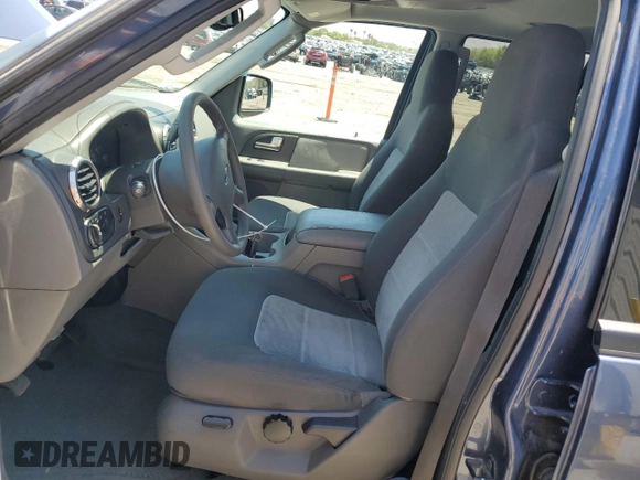 2004 Ford Expedition Special Service with VIN 1FMRU15W84LB85445, listed as a Copart auction lot 59897495 with 132,243 mi miles and Salvage title. Bid and sale history available at DreamBid. Image 7.