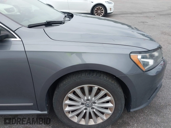 2016 Volkswagen Passat SE z VIN 1VWBT7A36GC007977, wystawiony jako IAAI lot #42433371 z przebiegiem 124 064 mil mil oraz . Historia ofert i sprzedaży dostępna na DreamBid. Obrazek 6.