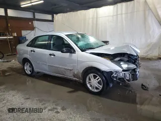 2003 Ford Focus SE z VIN 1FAFP34P43W186633, wystawiony jako Copart lot #56899065 z przebiegiem Nie podano mil oraz Szkoda całkowita • Salvage title. Historia ofert i sprzedaży dostępna na DreamBid. Obrazek 4.