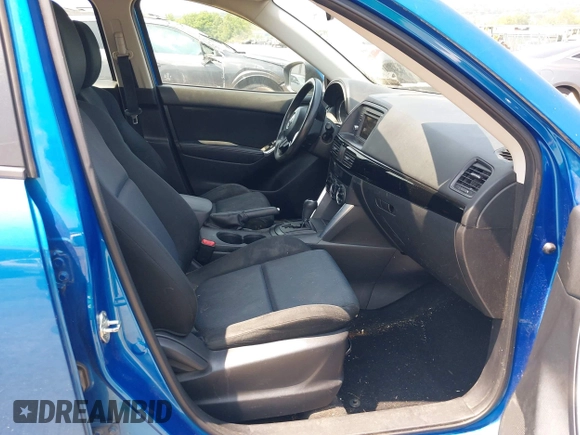 2014 Mazda CX-5 Sport z VIN JM3KE4BE4E0367444, wystawiony jako IAAI lot #42431272 z przebiegiem 181 191 mil mil oraz . Historia ofert i sprzedaży dostępna na DreamBid. Obrazek 5.