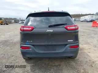 2014 Jeep Cherokee Latitude with VIN 1C4PJMCS5EW201459, listed as a IAAI auction lot 42092653 with 147,430 mi miles. Bid and sale history available at carsss.com. Image 16.