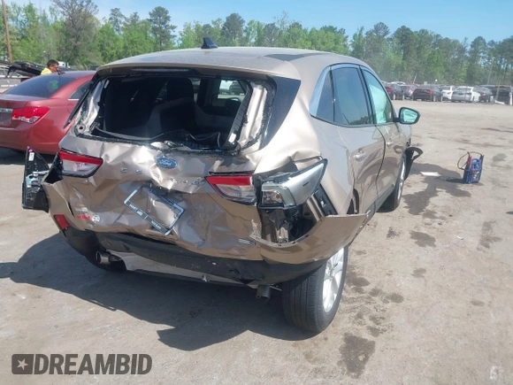 2020 Ford Escape SE with VIN 1FMCU9G6XLUA25108, listed as a IAAI auction lot 42106136 with 73,746 mi miles and . Bid and sale history available at DreamBid. Image 4.