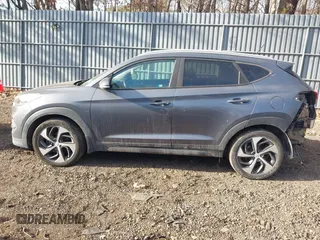 2016 Hyundai Tucson Sport with VIN KM8J33A21GU232747, listed as a IAAI auction lot 41443169 with 111,319 mi miles. Bid and sale history available at carsss.com. Image 14.