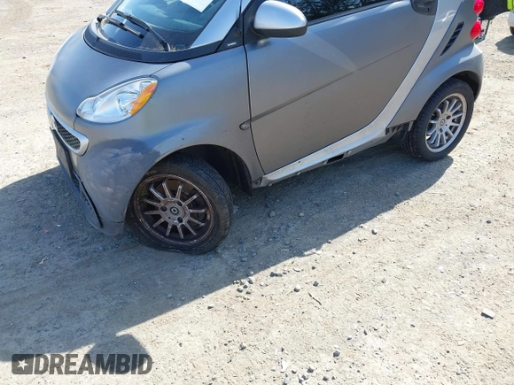 2013 Smart fortwo Pure с VIN WMEEJ3BA5DK622812, выставлен на аукционе IAAI как лот 42356026 с пробегом 64 983 миль миль и . История ставок и продаж доступна на DreamBid. Изображение 6.