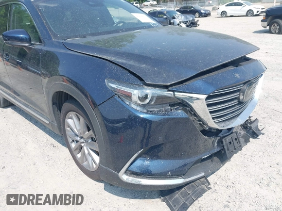 2021 Mazda CX-9 Carbon Edition z VIN JM3TCBDY7M0536005, wystawiony jako IAAI lot #42424129 z przebiegiem 48 005 mil mil oraz . Historia ofert i sprzedaży dostępna na DreamBid. Obrazek 19.