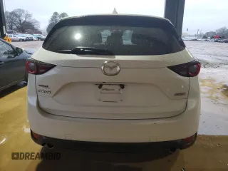 2019 Mazda CX-5 Touring with VIN JM3KFACM6K1608461, listed as a Copart auction lot 45063465 with 64,988 mi miles and Non Repairable. Bid and sale history available at carsss.com. Image 6.