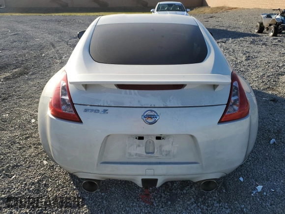 2014 Nissan 370Z Touring with VIN JN1AZ4EH7EM637101, listed as a Copart auction lot 41339705 with 105,841 mi miles and Salvage Title. Bid and sale history available at carsss.com. Image 6.