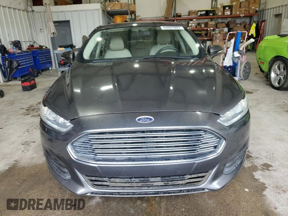 2015 Ford Fusion SE z VIN 3FA6P0H7XFR151594, wystawiony jako Copart lot #44697805 z przebiegiem 150 861 mil mil oraz Szkoda całkowita • Salvage title. Historia ofert i sprzedaży dostępna na DreamBid. Obrazek 5.