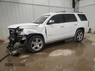 2020 Chevrolet Tahoe Premier with VIN 1GNSKCKC1LR125804, listed as a Copart auction lot 83228094 with 61,841 mi miles and Salvage title. Bid and sale history available at DreamBid. Image 1.