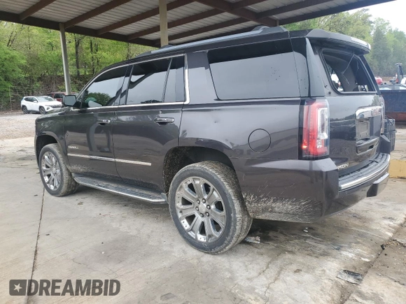 2016 GMC Yukon Denali with VIN 1GKS2CKJ0GR366206, listed as a Copart auction lot 52105185 with 150,141 mi miles and Salvage Title. Bid and sale history available at carsss.com. Image 2.