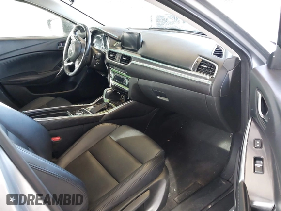 2017 Mazda Mazda6 Touring with VIN JM1GL1V50H1144637, listed as a IAAI auction lot 41849569 with 100,047 mi miles. Bid and sale history available at carsss.com. Image 5.