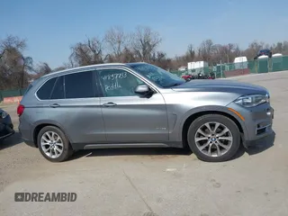2015 BMW X5 xDrive35i with VIN 5UXKR0C53F0K60910, listed as a IAAI auction lot 41857733 with 153,583 mi miles. Bid and sale history available at carsss.com. Image 13.