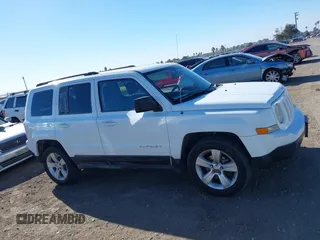 2011 Jeep Patriot Latitude with VIN 1J4NT1GB0BD105816, listed as a IAAI auction lot 41330180 with 143,431 mi miles. Bid and sale history available at carsss.com. Image 13.