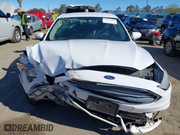2018 Ford Fusion SE z VIN 3FA6P0LU3JR102971, wystawiony jako IAAI lot #41814321 z przebiegiem 135 472 mil mil oraz . Historia ofert i sprzedaży dostępna na DreamBid. Obrazek 12.