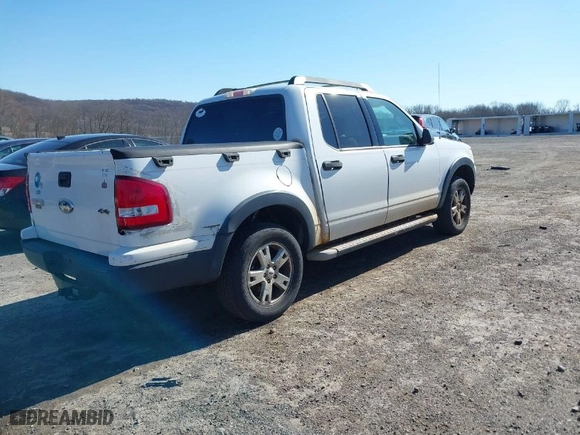 2007 Ford Explorer Sport Trac XLT with VIN 1FMEU51K67UA23174, listed as a IAAI auction lot 41867751 with 111,316 mi miles. Bid and sale history available at carsss.com. Image 4.