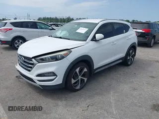 2018 Hyundai Tucson Sport with VIN KM8J33AL5JU691991, listed as a IAAI auction lot 41817480 with 89,129 mi miles. Bid and sale history available at carsss.com. Image 17.