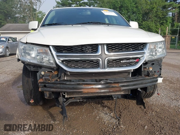 2013 Dodge Journey Crew with VIN 3C4PDCDG0DT591533, listed as a IAAI auction lot 42630548 with 164,961 mi miles and . Bid and sale history available at DreamBid. Image 6.
