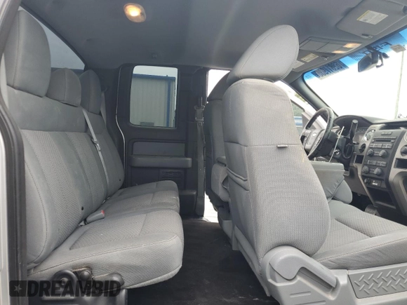 2011 Ford F-150 XL with VIN 1FTFX1CF4BFC86043, listed as a Copart auction lot 62817935 with 284,163 mi miles and Salvage title. Bid and sale history available at DreamBid. Image 10.