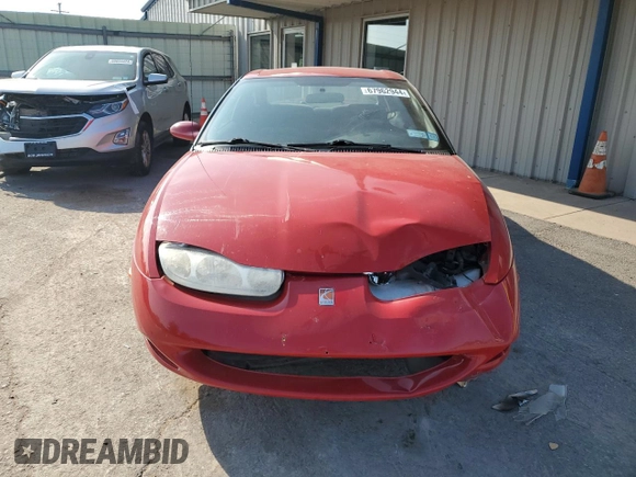2001 Saturn SC z VIN 1G8ZY127X1Z116460, wystawiony jako Copart lot #67962944 z przebiegiem 93 372 mil mil oraz Nie do naprawy. Historia ofert i sprzedaży dostępna na DreamBid. Obrazek 5.