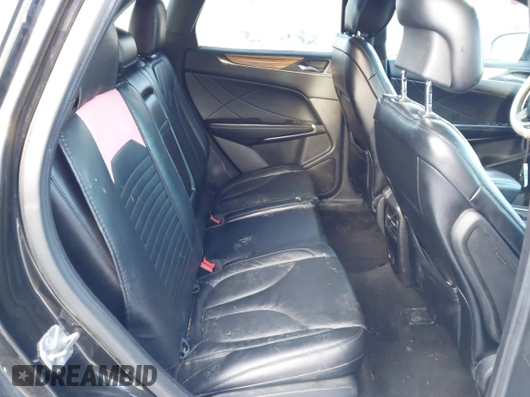 2015 Lincoln MKC with VIN 5LMTJ2AHXFUJ01440, listed as a IAAI auction lot 41526975 with 104,280 mi miles. Bid and sale history available at carsss.com. Image 8.