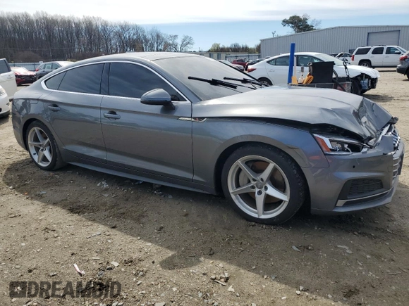 2018 Audi A5 Sportback Premium Plus with VIN WAUENCF54JA061579, listed as a Copart auction lot 49899095 with 90,295 mi miles and Salvage Title. Bid and sale history available at DreamBid. Image 4.