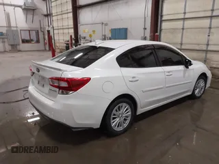 2018 Subaru Impreza Premium with VIN 4S3GKAB68J3610714, listed as a IAAI auction lot 41774380 with 114,745 mi miles. Bid and sale history available at carsss.com. Image 4.