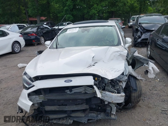 2017 Ford Fusion Titanium with VIN 3FA6P0K96HR105127, listed as a IAAI auction lot 39351701 with 103,295 mi miles. Bid and sale history available at carsss.com. Image 13.