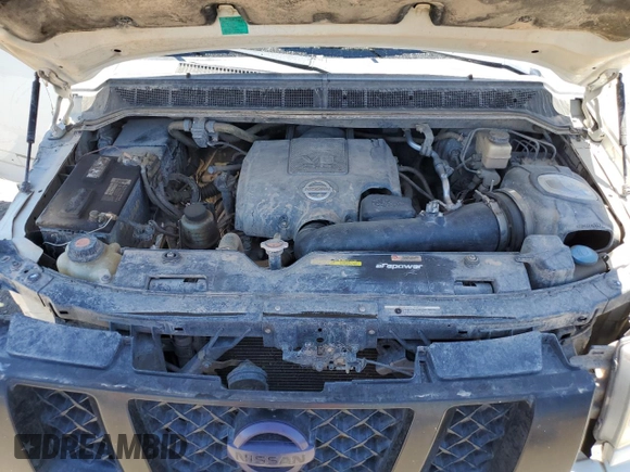 2015 Nissan Titan Pro-4X z VIN 1N6AA0EC9FN512658, wystawiony jako Copart lot #68066964 z przebiegiem 131 026 mil mil oraz Szkoda całkowita • Salvage title. Historia ofert i sprzedaży dostępna na DreamBid. Obrazek 12.