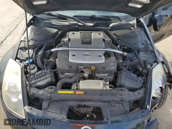 2007 Nissan 350Z with VIN JN1BZ34D97M504887, listed as a Copart auction lot 77140104 with 115,128 mi miles and Salvage Title. Bid and sale history available at DreamBid. Image 11.
