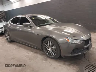 2014 Maserati Ghibli z VIN ZAM57XSA2E1083363, wystawiony jako IAAI lot #41804556 z przebiegiem 115 434 mil mil oraz . Historia ofert i sprzedaży dostępna na DreamBid. Obrazek 1.