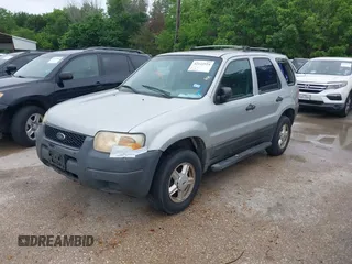 2003 Ford Escape XLS Popular with VIN 1FMYU02123KA32790, listed as a IAAI auction lot 42122524 with 244,560 mi miles and . Bid and sale history available at DreamBid. Image 2.