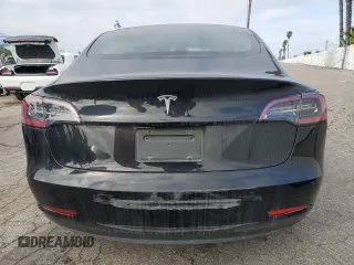 2023 Tesla Model 3 z VIN 5YJ3E1EA7PF460323, wystawiony jako Copart lot #44800265 z przebiegiem 47 702 mil mil oraz Nie do naprawy • Non repairable. Historia ofert i sprzedaży dostępna na DreamBid. Obrazek 6.