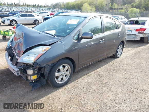 2007 Toyota Prius z VIN JTDKB20U273203420, wystawiony jako IAAI lot #42120951 z przebiegiem 261 452 mil mil oraz . Historia ofert i sprzedaży dostępna na DreamBid. Obrazek 2.