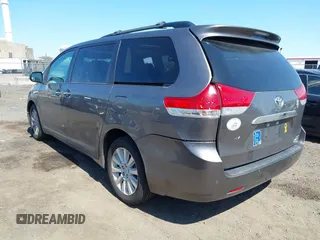2013 Toyota Sienna XLE with VIN 5TDDK3DC0DS059036, listed as a IAAI auction lot 42069896 with 124,105 mi miles and . Bid and sale history available at DreamBid. Image 3.