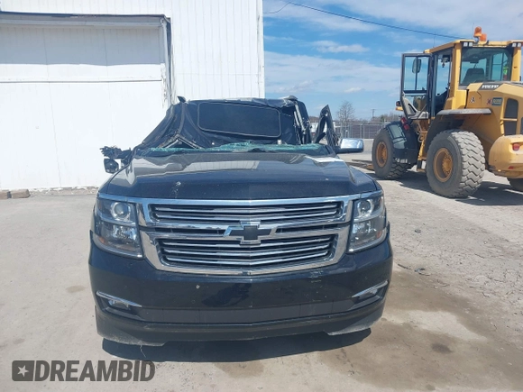 2015 Chevrolet Suburban LTZ with VIN 1GNSKKKC9FR280390, listed as a IAAI auction lot 41882449 with 80,499 mi miles and . Bid and sale history available at DreamBid. Image 12.