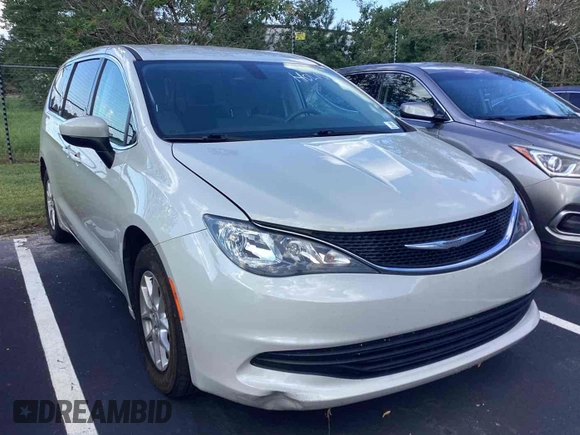 2017 Chrysler Pacifica Touring with VIN 2C4RC1DG5HR764942, listed as a IAAI auction lot 42255421 with 64,381 mi miles and . Bid and sale history available at DreamBid. Image 29.