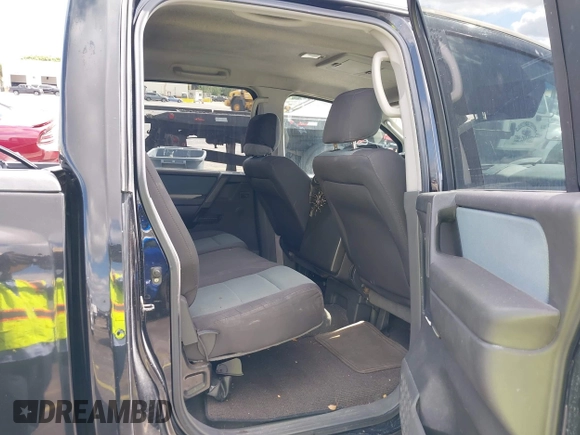 2005 Nissan Titan SE with VIN 1N6AA07A05N501283, listed as a IAAI auction lot 39151799 with 129,069 mi miles and . Bid and sale history available at DreamBid. Image 8.