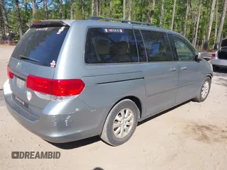 2008 Honda Odyssey EX with VIN 5FNRL38428B067056, listed as a IAAI auction lot 42051312 with 199,405 mi miles. Bid and sale history available at carsss.com. Image 4.